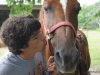 Kissing a friendly horse